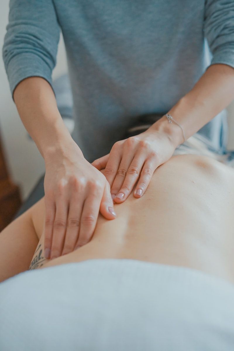 Therapist performing therapeutic massage
